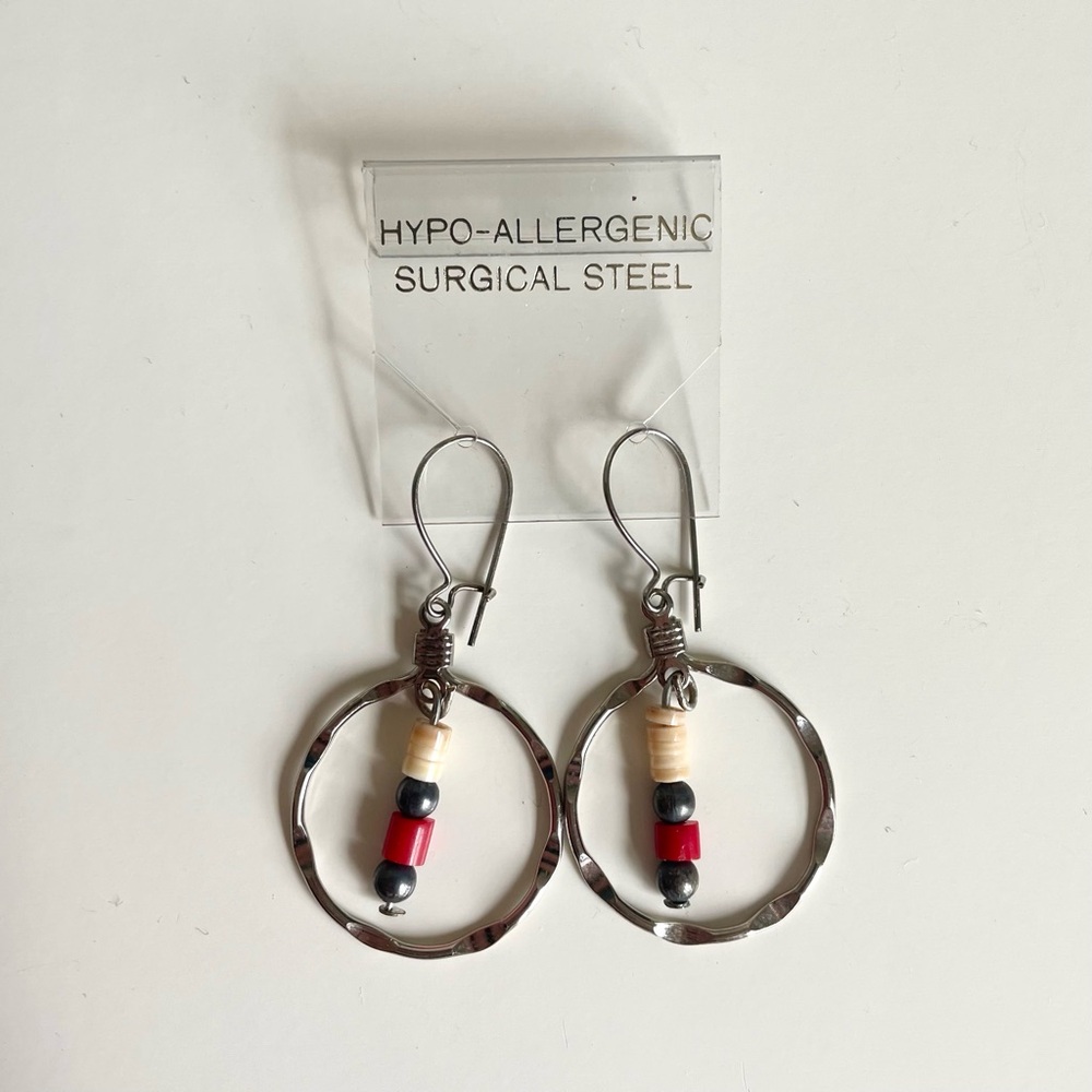Hypoallergenic surgical steel earrings with a silver tone and beads